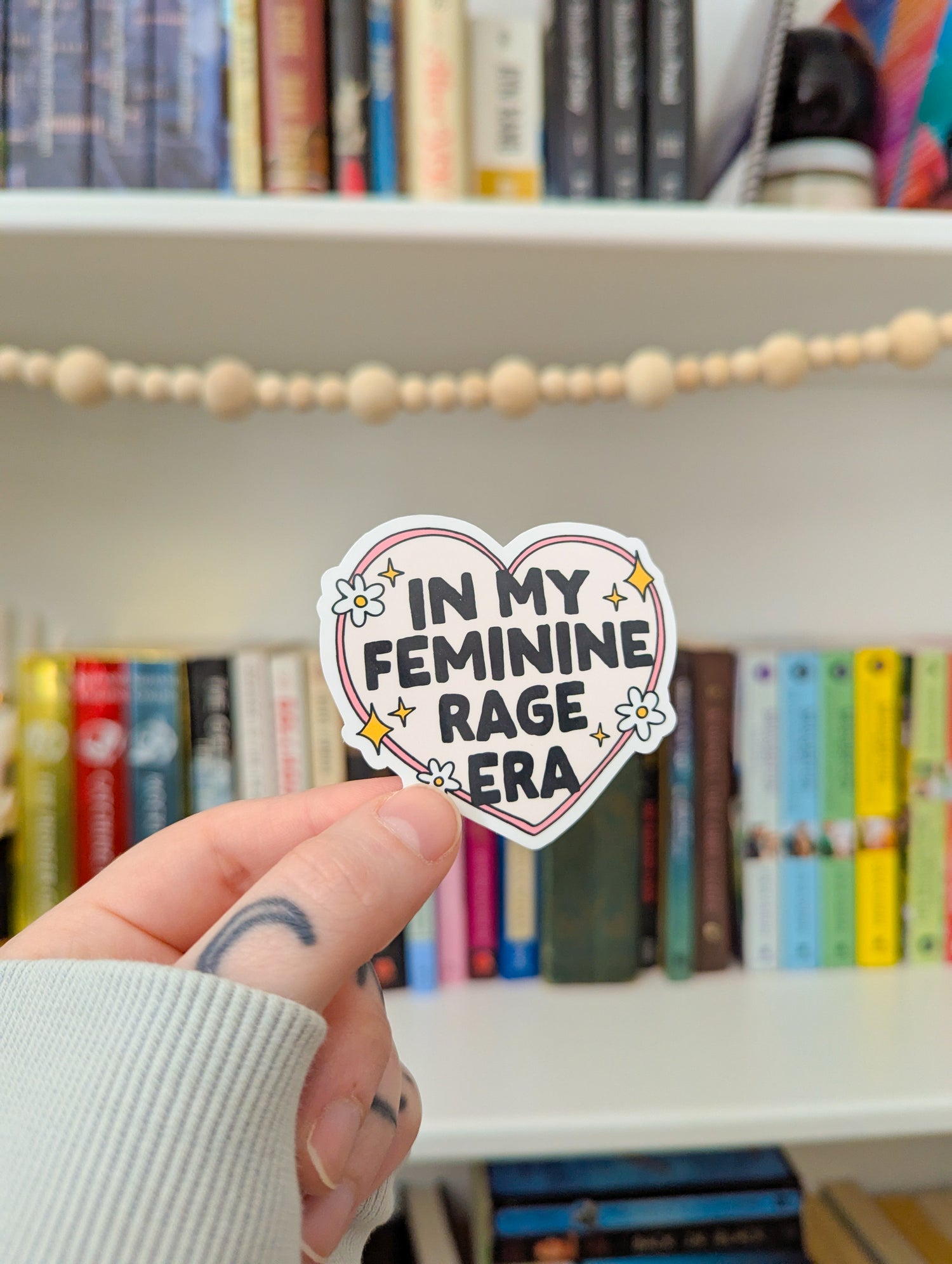 feminine rage era sticker